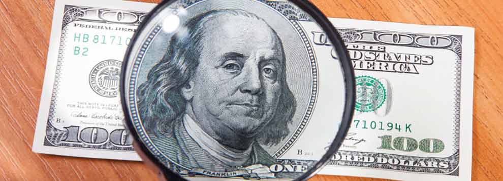 ben-franklin-magnified-on-hundred-dollar-bill-990x358