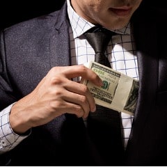 https://www.forensicscolleges.com/wp-content/uploads/2019/01/businessman-putting-dollar-banknotes-into-pocket-picture-id912379642-min.jpg