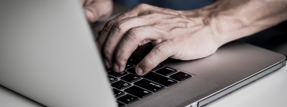 hands-of-man-user-using-computer-notebook-laptop-typing-on-keyboard-picture-id1154020340-min